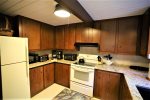 Fully equipped kitchen with granite countertops and dishwasher